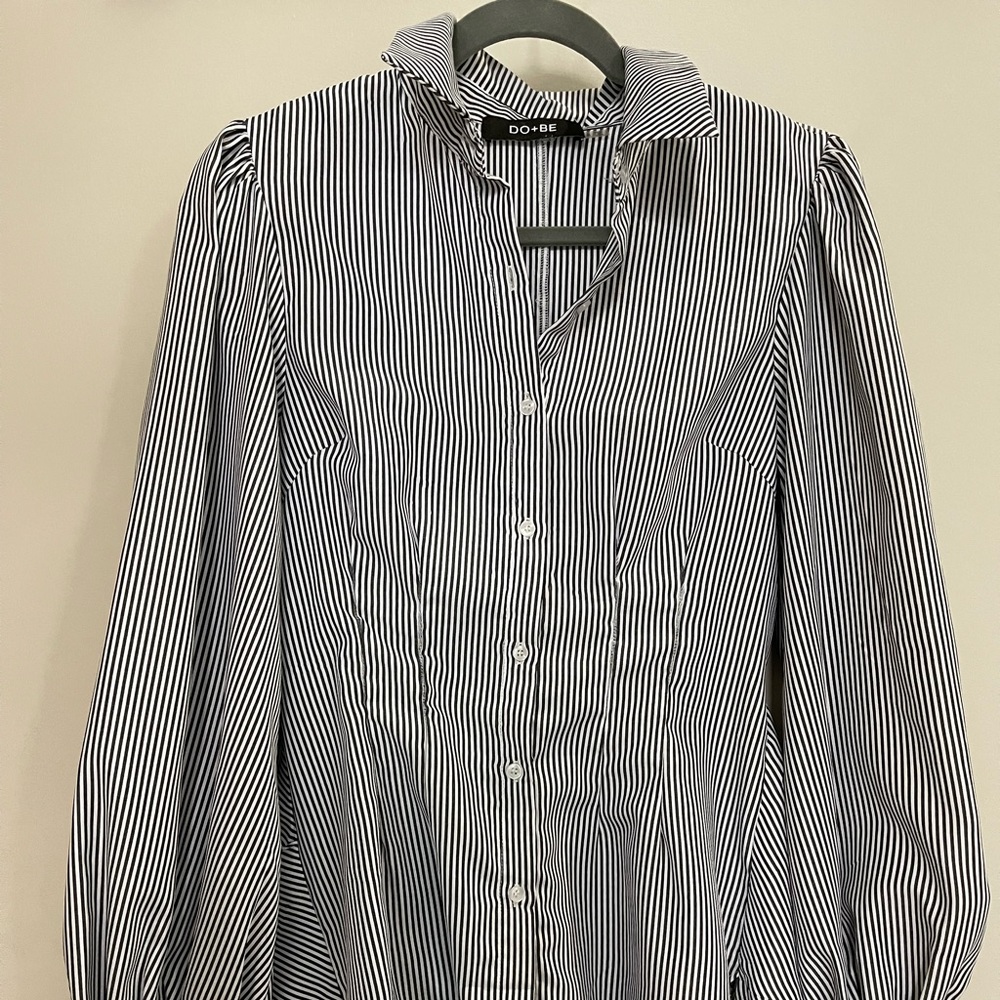 Puffy sleeved dress shirt.